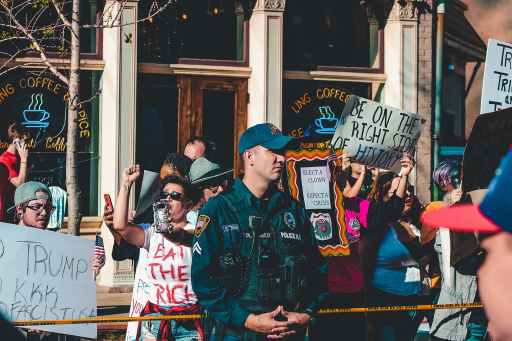 protesters standing outside a city building